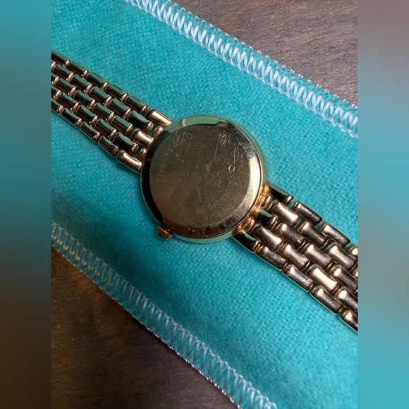 Vintage Tiffany & Co. ladies 14k yellow gold watch with diamonds around bezel. - Picture 5 of 12